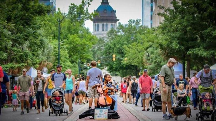 People walking through street fair in Columbia